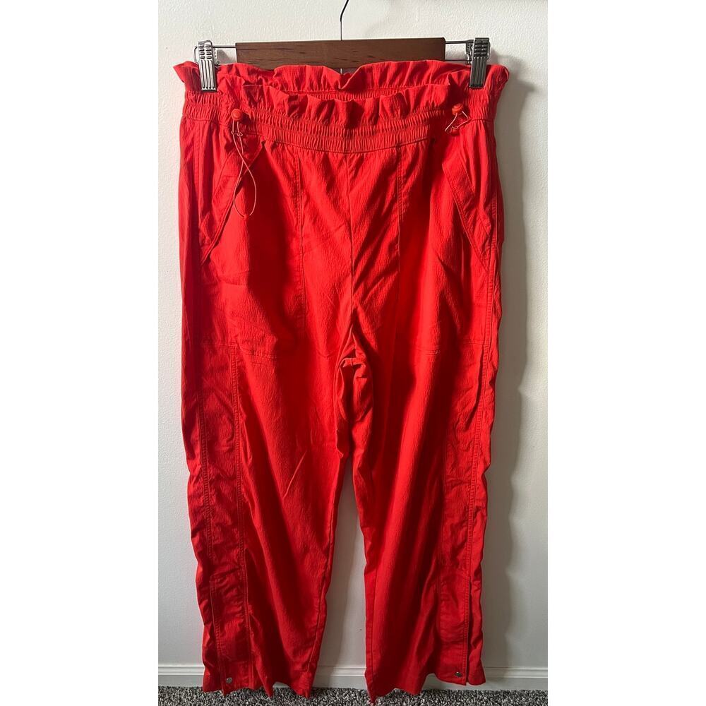 Athleta Trekkie high rise patachute pants orangey red color women's size 8